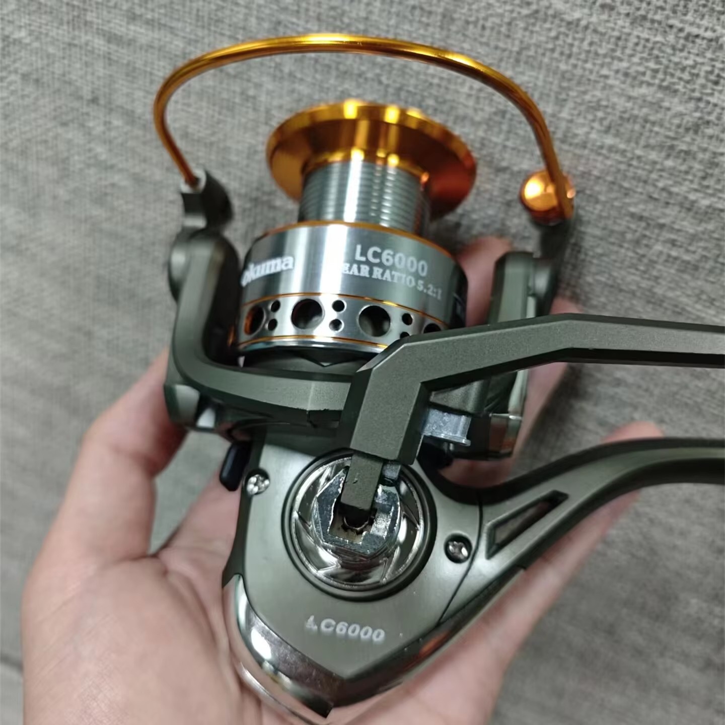 Carretilha de Pesca Okuma de A - Daiwa Reel Fuego avaliação e preço